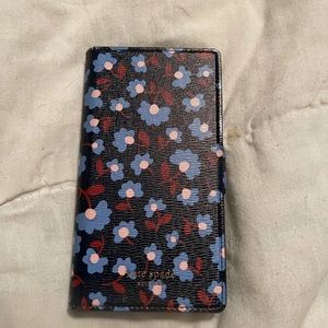 Kate Spade IPhone X magnetic wallet case.